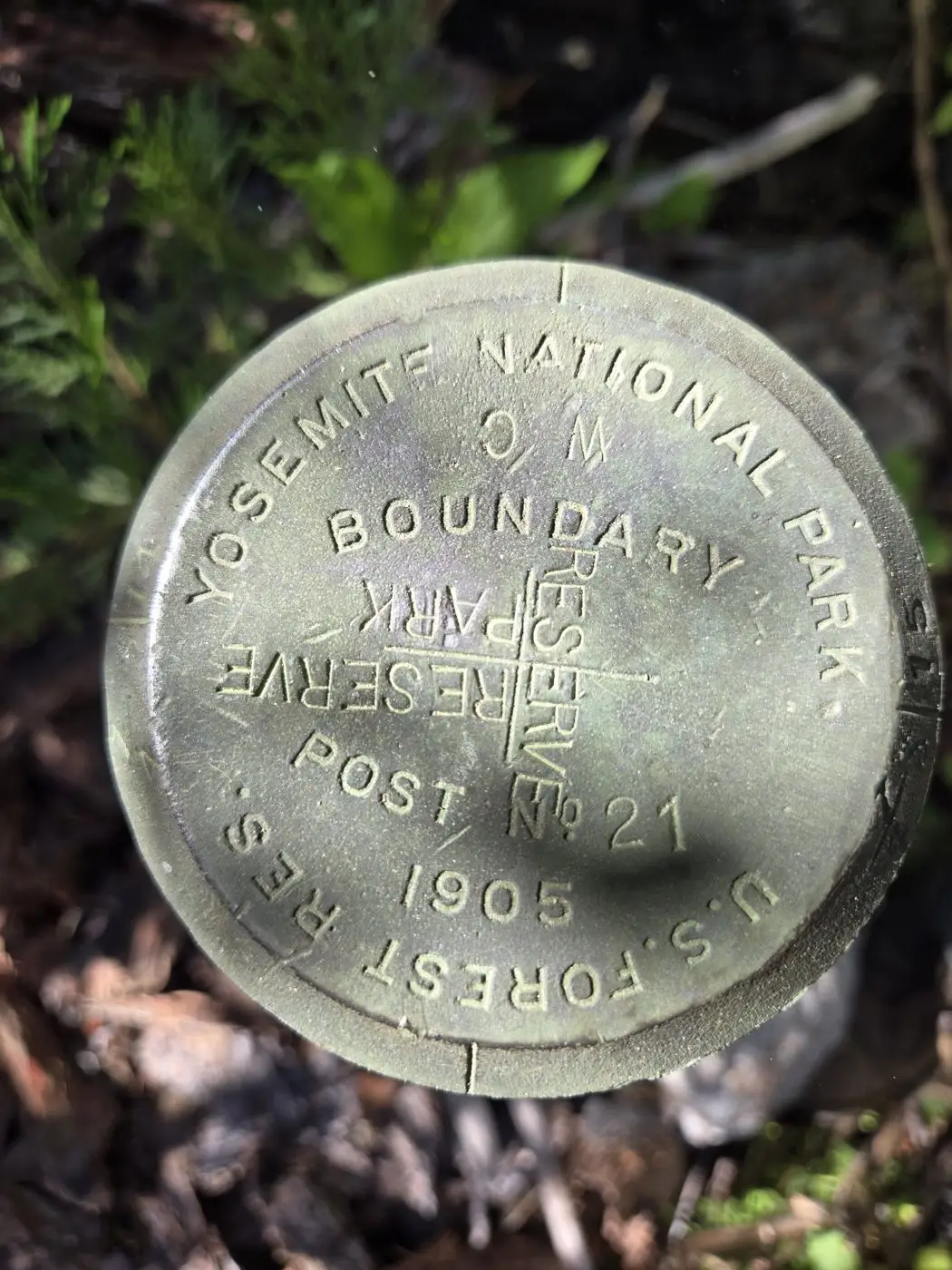 Bronze cap stamped Yosemite National Park Boundary, U.S. Forest Reserve, Post No. 21, 1905
